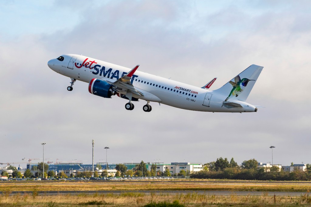 A JetSmart Airbus A320neo takes off