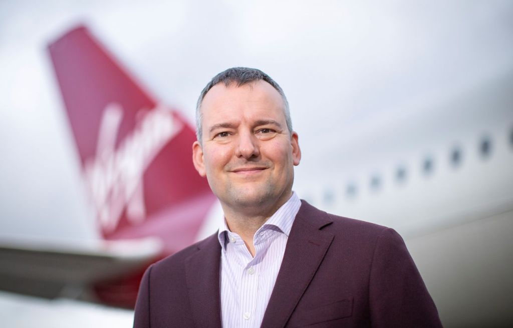 Corneel Koster, the Virgin Atlantic executive beside a plane.